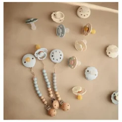 Mushie Attache-tétine Eva | Bleu Online