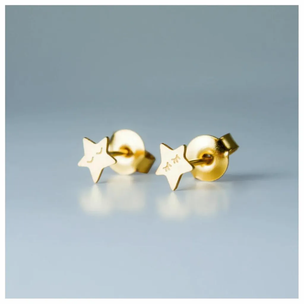 Adorabili Boucles d'oreilles Asymétriques Etoiles | Doré
